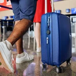 Luggage tracker with coin battery